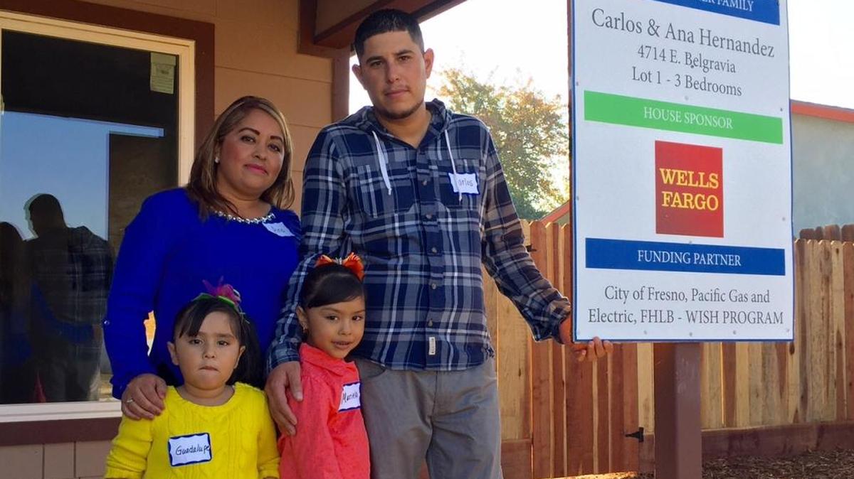 Ana Flores and Carlos Hernandez have a new home to enjoy with their daughters, Guadalupe and Mariela. It is the 131st home built through Habitat for Humanity Fresno.