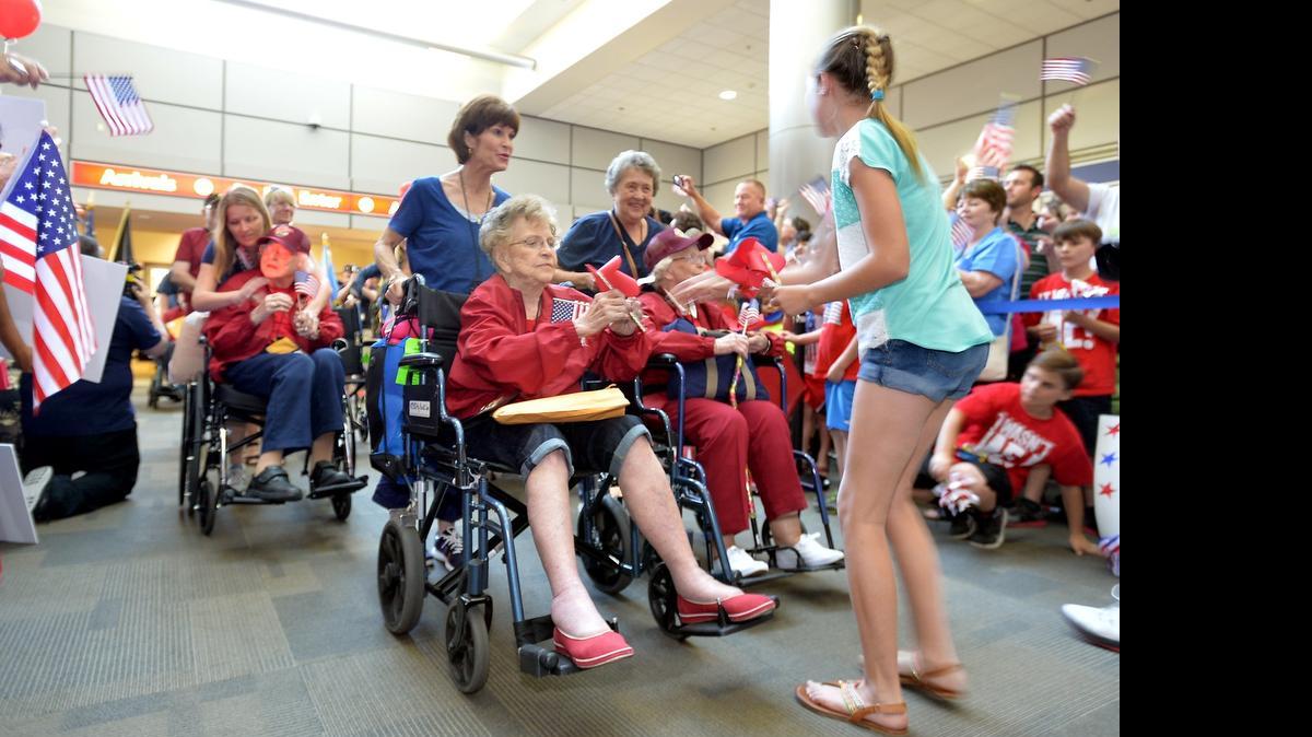 
World War WII veteran Margaret Bergthold, 93, of Fresno, returns from an Honor Flight. 
