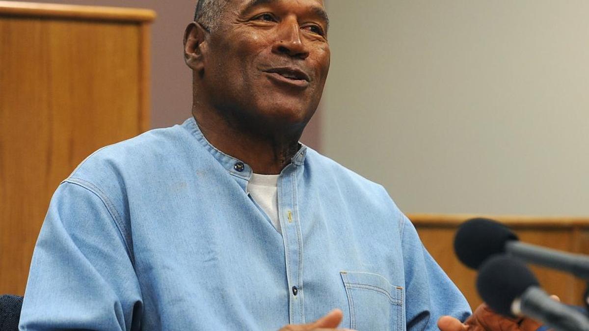 Former NFL football star O.J. Simpson appears via video for his parole hearing at the Lovelock Correctional Center in Lovelock, Nev., on Thursday. Simpson was granted parole Thursday after more than eight years in prison for a Las Vegas hotel heist, successfully making his case in a nationally televised hearing that reflected America’s enduring fascination with the former football star.