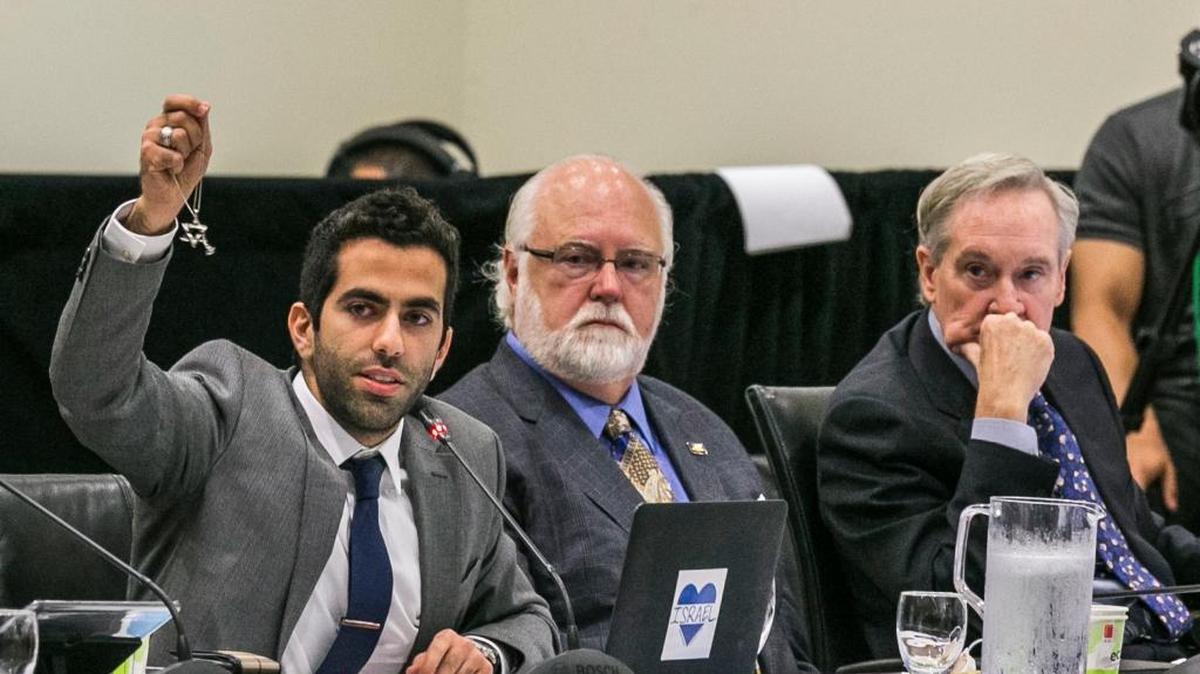 Abraham Oved, UC student regent, left, with appointed regents William De La Peña, center, and George Kieffer. A proposed constitutional amendment would shorten the terms of appointed regents to heighten legislators’ power over the historically autonomous public university.
