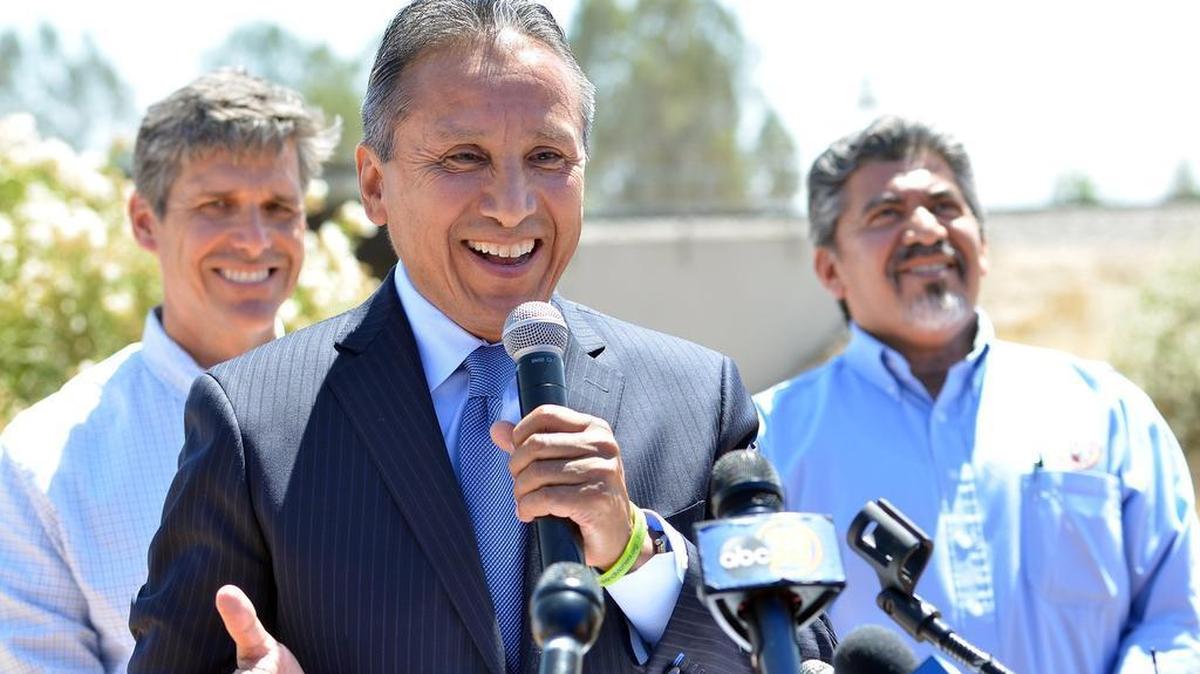 
Fresno County Supervisor Henry R. Perea speaks at a news conference to mark the beginning of construction of the first aerial structure of the California High Speed Rail at the intersection of Highway 145 at the BNSF railroad tracks in Madera on June 16.
