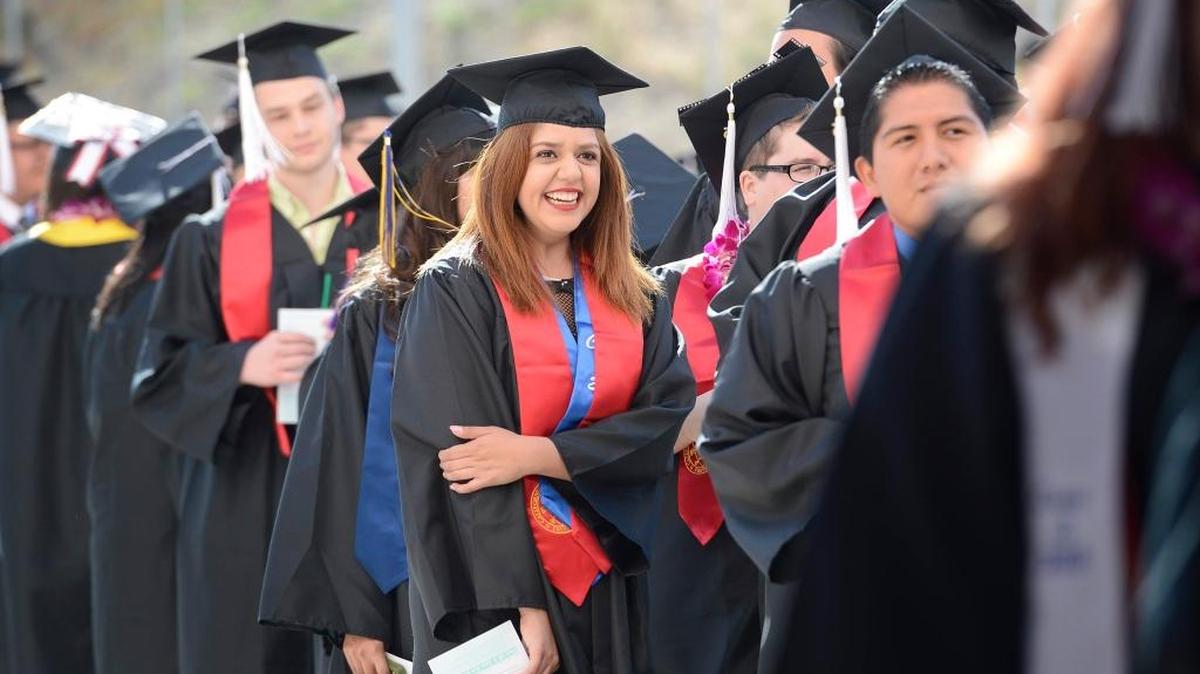 Fresno State graduating students wait before entering the Save Mart Center for the university’s 104th commencement Saturday, May 16, 2015. Over 5,000 students achieved their degrees last spring.