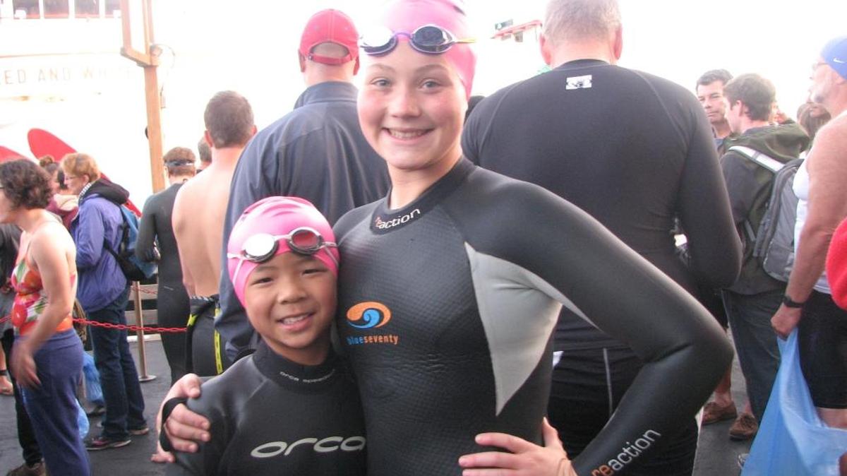 
Jaydan Chau, left, age 9, and Bre Bonds, 13, of Fresno after their open-sea swim from Alcatraz to San Francisco last weekend to bring awareness to childhood obesity. Bre lost 70 pounds a few years ago and has since become an avid athlete and advocate for fitness.
