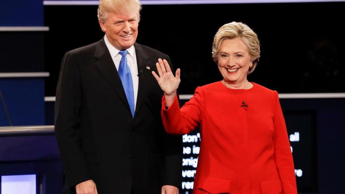 Republican presidential nominee Donald Trump and Democratic presidential nominee Hillary Clinton are introduced during the presidential debate at Hofstra University in Hempstead, N.Y.