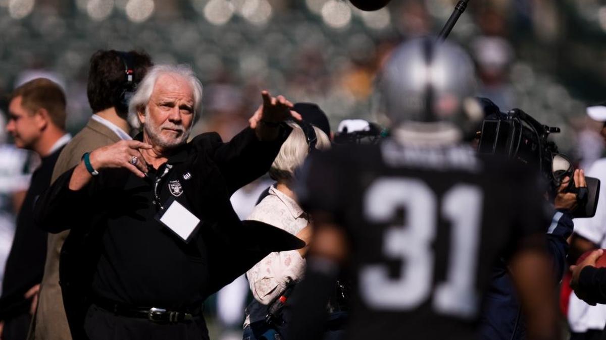 Ken Stabler tosses a pass before an Oakland Raiders game in 2008, about the time his family says he started showing signs of CTE.