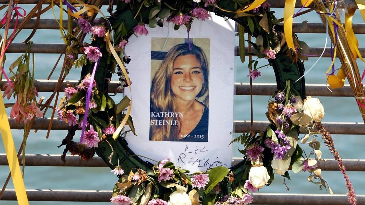 A portrait of Kate Steinle is shown in this 2015 file photo at a memorial on Pier 14 in San Francisco. Opening arguments started Monday in the trial of the man charged with her murder, Jose Ines Garcia Zarate.