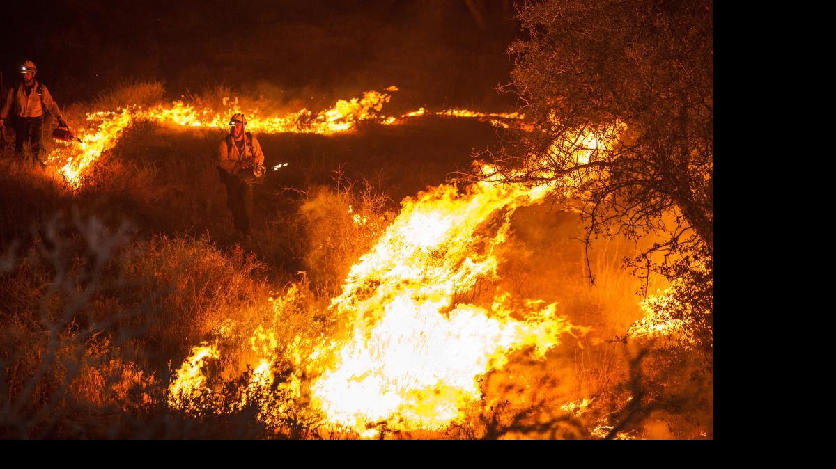 
Officials says that five drones hampered firefighters to the point that a wildfire jumped Interstate 15, sending people running for their lives earlier this month near the Cajon Pass in San Bernardino County. The 5.5-square-mile fire destroyed 20 vehicles on the freeway before burning three homes and 44 more vehicles in the community of Baldy Mesa.
