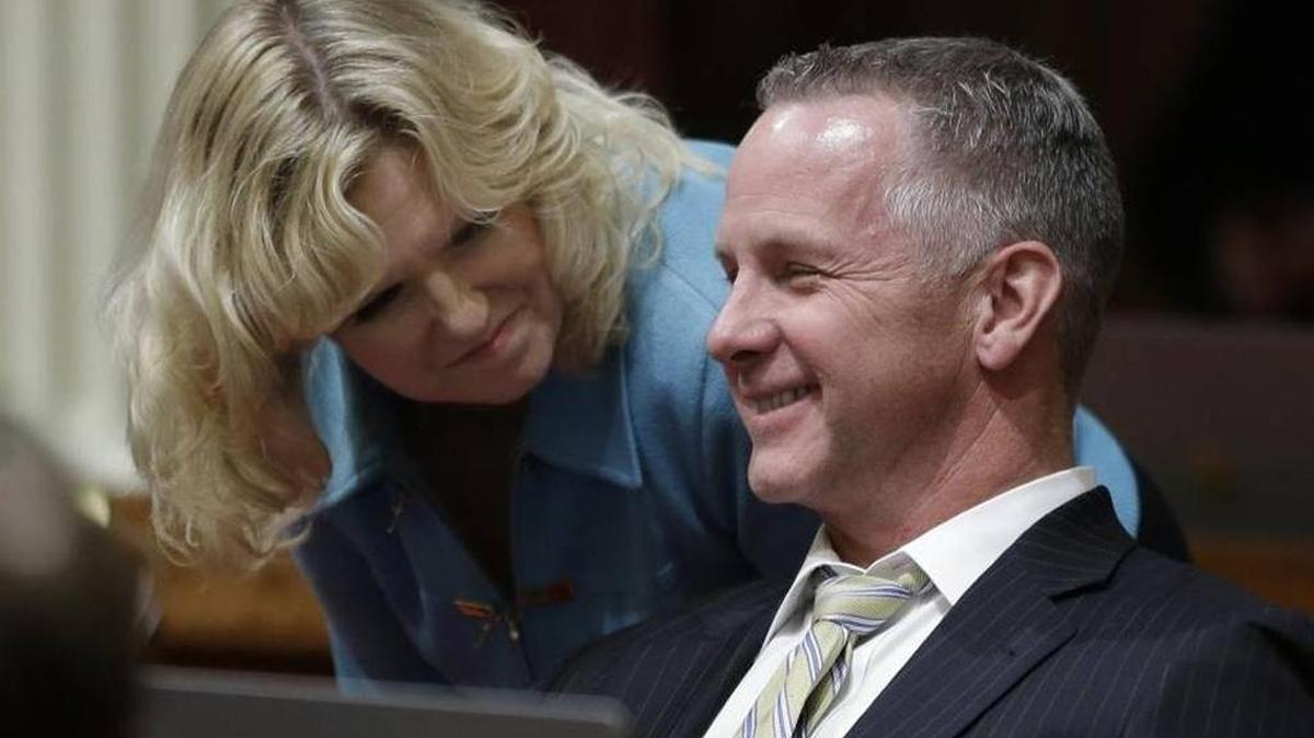 State Sen. Anthony Cannella, R-Ceres, talks with Sen. Cathleen Galgiani, D-Stockton, on April 6, as lawmakers debate a transportation bill that would increase California’s gas and vehicle taxes $5 billion a year to pay for major road repairs. Cannella joined Democrats in voting for the bill.