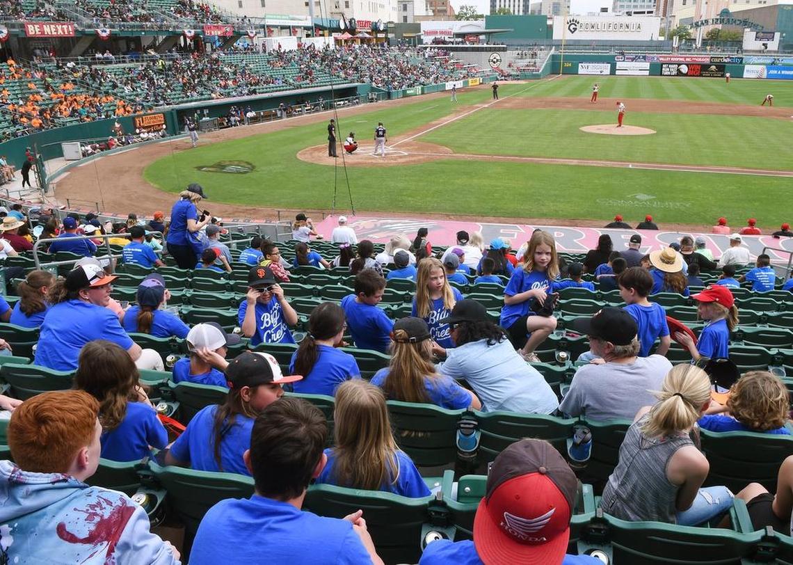 Big Creek Elementary students awatch the start of the Fresno Grizzlies game in April.