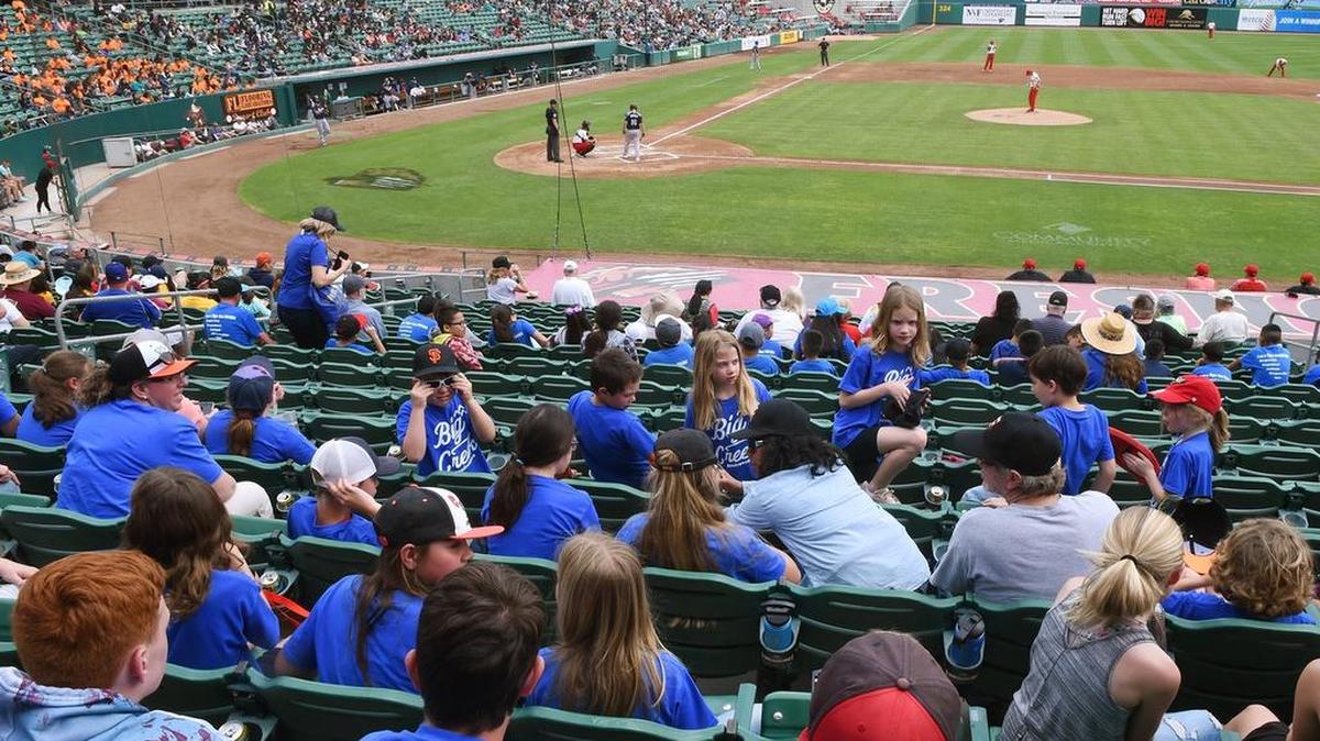 Big Creek Elementary students awatch the start of the April 8 Fresno Grizzlies game. Over the Memorial Day weekend the Grizzlies ran a video that showed U.S. Rep. Alexandria Ocasio-Cortez in a bad light; the team apologized but some fans remain upset.