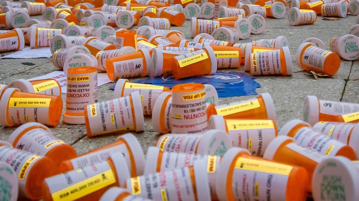 Members of P.A.I.N. (Prescription Addiction Intervention Now) and Truth Pharm staged a protest on Sept. 12, 2019 outside Purdue Pharma headquarters in Stamford, Connecticut over a recent controversial opioid settlement. Participants dropped hundreds prescription bottles of OxyContin while holding tombstones with the names of opioids casualties and banners reading “Shame on Sackler” and “200 Dead Each Day.”
