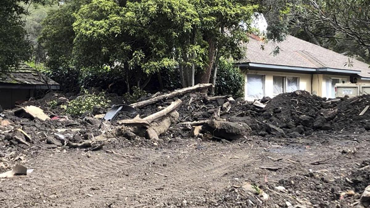 This photo provided by KEYT-TV shows a damaged home Tuesday, March 5, 2019, more than a year after devastating floods hit this Montecito, Calif., neighborhood. The Santa Barbara County Sheriff's Office ordered about 3,000 residents to evacuate ahead of a new storm expected to hit areas scarred by wildfires, including parts of Montecito hit by a disastrous debris flow just over a year ago.