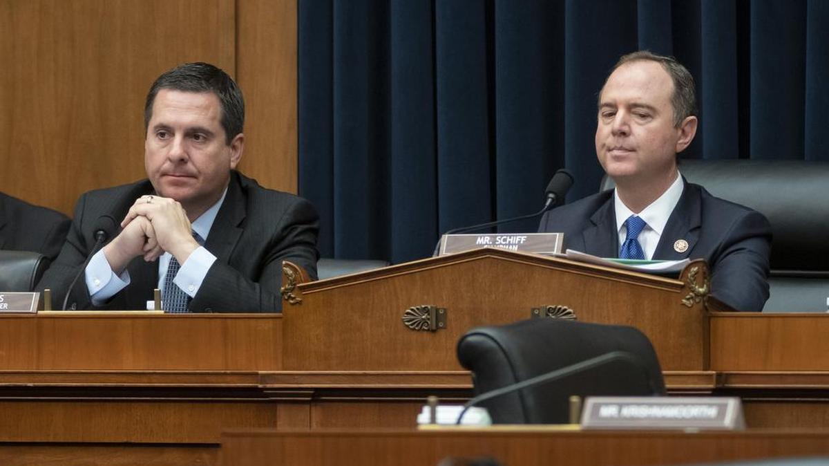 Rep. Devin Nunes, R-Calif, ranking member of the House Intelligence Committee, left, and Chairman Adam Schiff, D-Calif., right, listen to witnesses as the Democrat-controlled panel pushed ahead with their oversight of the Trump administration at a hearing to examine to examine “Putin’s Playbook,” how the Russian government works to undermine its adversaries, especially the U.S., on Capitol Hill in Washington, Thursday, March 28, 2019. (AP Photo/J. Scott Applewhite)