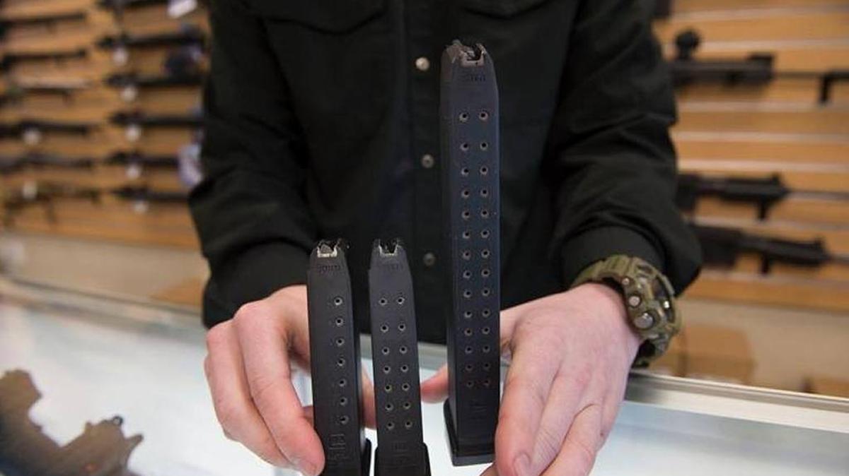 Nate Woodward, manager of Sacramento Black Rifle, displays 9 mm pistol magazines at his Citrus Heights store last year. The 10-round magazine on the left side of the photo is the only one that will be legal to possess in California as of July 1, under a suite of new gun laws state voters and lawmakers passed last year.