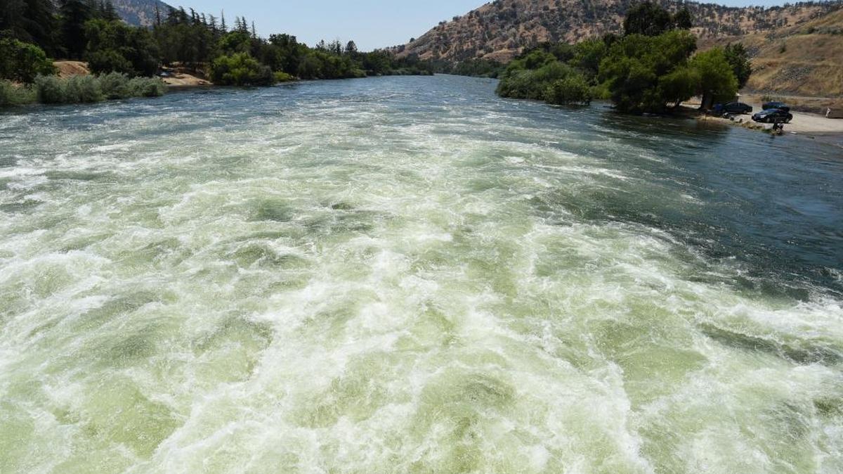 The Kings River as it roils under the bridge beneath Pine Flat Dam on June 19, 2017.