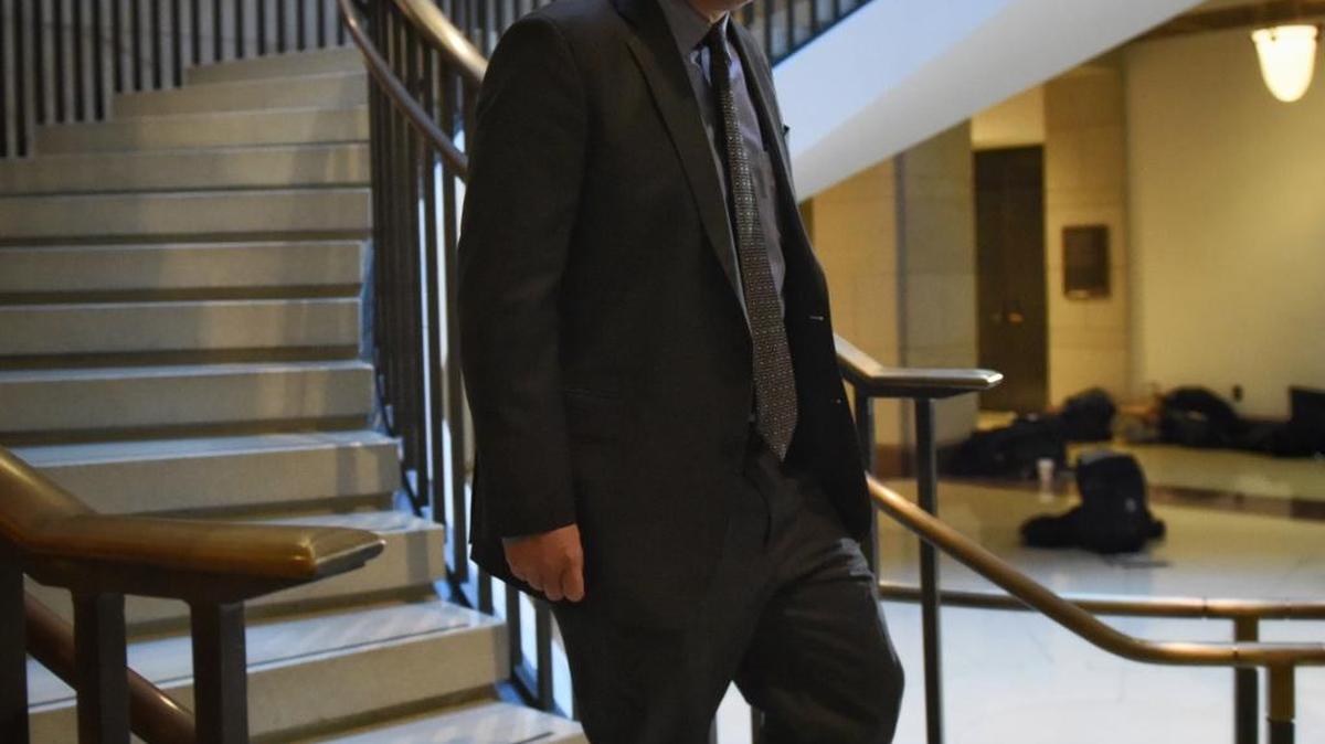 Rep. Devin Nunes, R-Tulare, makes his way Monday to the House Intelligence Committee to vote on releasing a Democratic rebuttal to GOP accusations that the FBI misled a secret surveillance court.