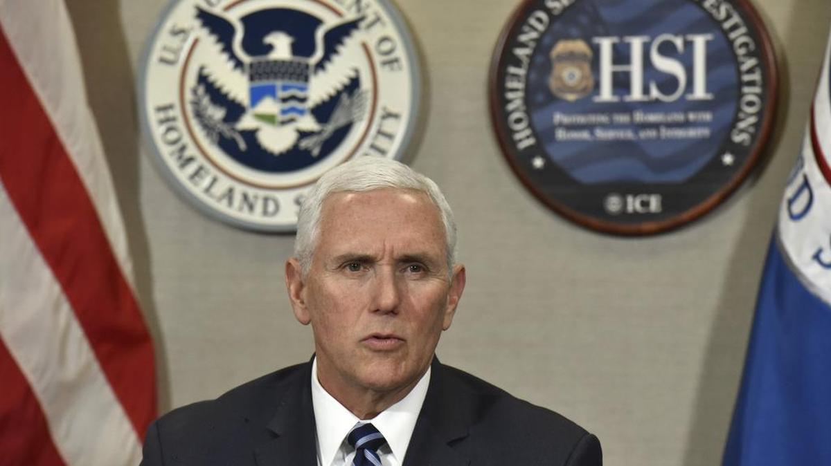 Vice President Mike Pence talks with ICE top officials before he receives a briefing at Homeland Security Investigation Principal Field Offices in Atlanta on Thursday, March 21, 2019.