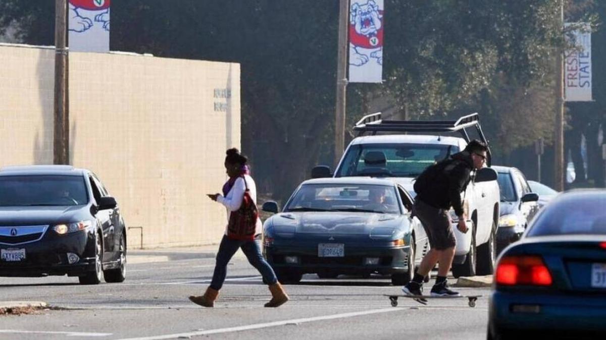 The intersection at Cedar Avenue and Bulldog Lane got a new left-turn signal to benefit the large student and sports-fan pedestrian traffic. This picture was taken before the signal was added. On Nov. 1, a jury rejected a lawsuit that claimed the intersection was dangerous and caused motorcyclist Steven Kennedy to collide with a car and get badly injured in April 2014. Bee letter writer Al Perry has some advice for drivers and motorcyclists to keep everyone safer.