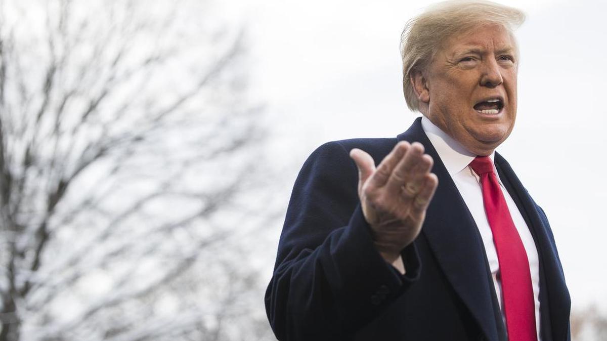 President Donald Trump speaks to reporters as he departs from the White House for Kenner, Louisiana, where he was to speak at the American Farm Bureau Federation’s annual convention. The Trump administration said that it would summon tens of thousands of federal employees back to work without pay to get the government running amid a partial shutdown well into its third week, as the White House and increasingly agitated lawmakers on Capitol Hill cast about for a way to end to the stalemate.