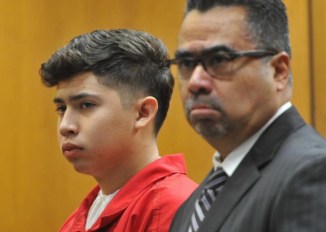 Along with his attorney, Eddie Ruiz, right, Rogelio Alvarez Maravilla listens to statements made by Gavin Gladdingâ€™s family during his sentencing of three years in prison Monday morning in Superior Court for the hit-and-run killing of the Clovis Unified vice principal.