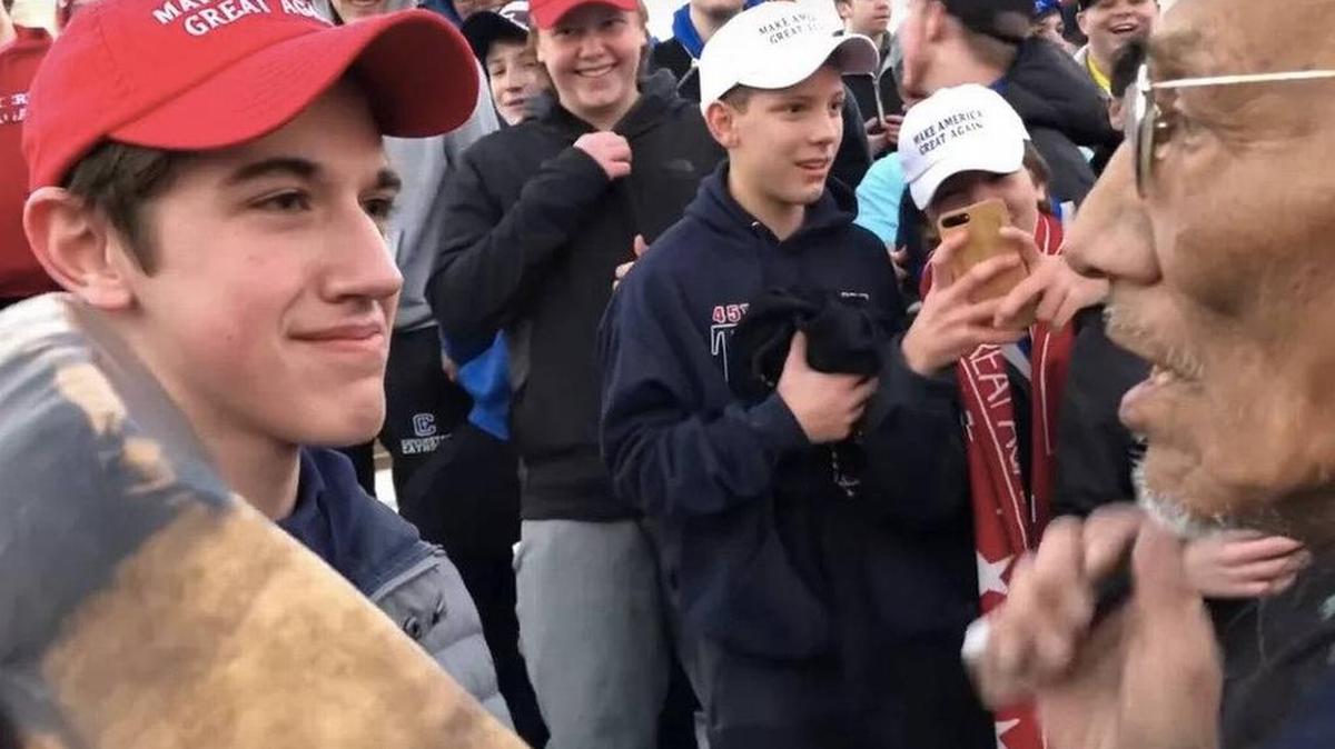 Nick Sandmann, a junior from Covington Catholic high school in Kentucky, encounters Nathan Phillips, a 64-year-old elder of the Omaha people and a Vietnam veteran, on the National Mall in January.