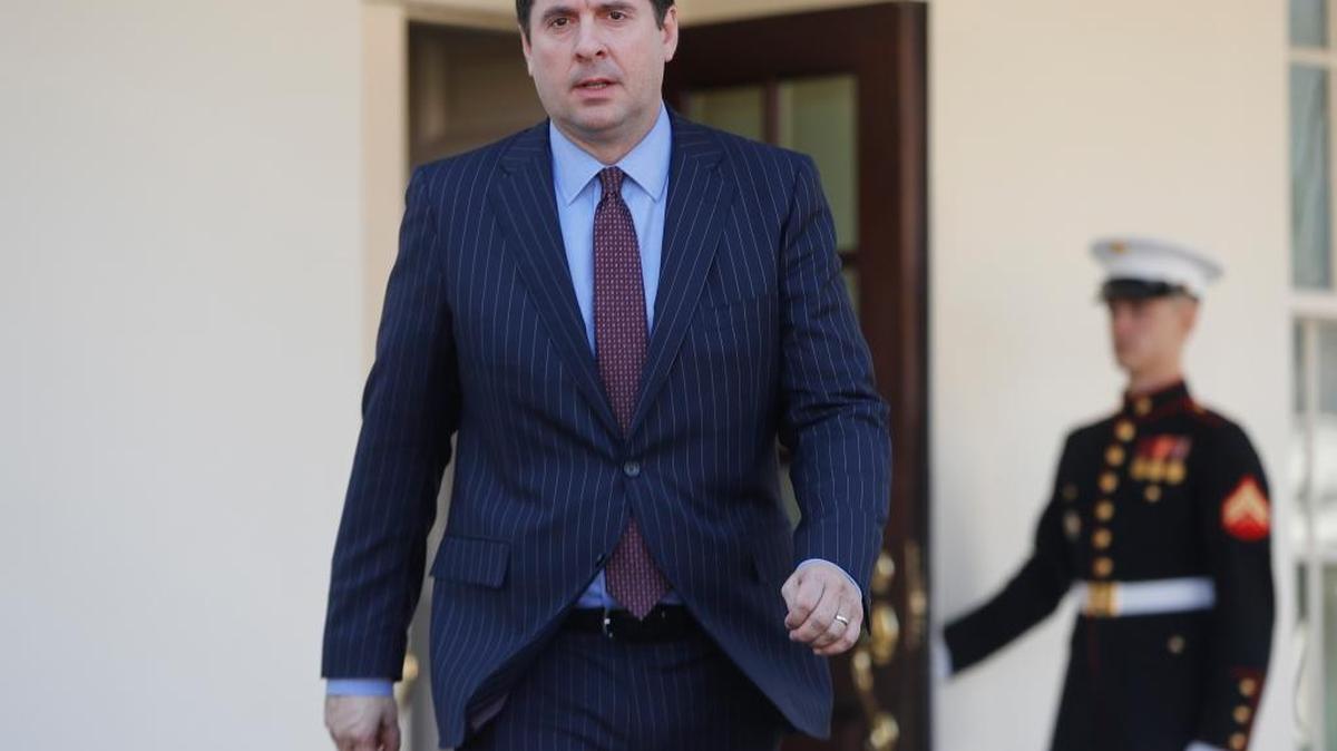 House Intelligence Committee Chairman Rep. Devin Nunes, R-Tulare, walks out the White House March 22, 2017, to speak with reporters after a meeting with President Donald Trump.