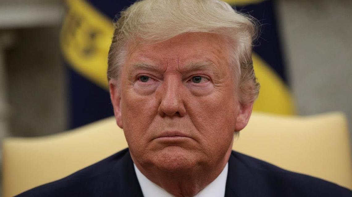 President Donald Trump pauses as he meets with Italian President Sergio Mattarella in the Oval Office on Wednesday.