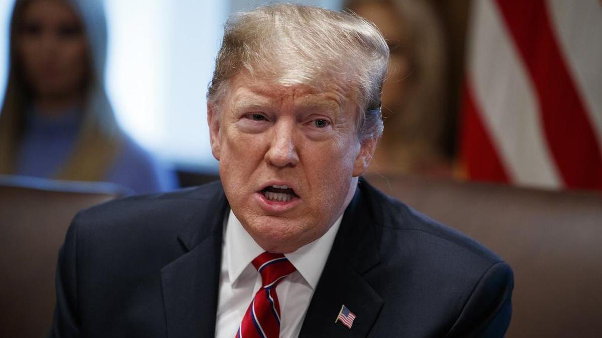 President Donald Trump speaks during a cabinet meeting on Feb. 12 at the White House in Washington.