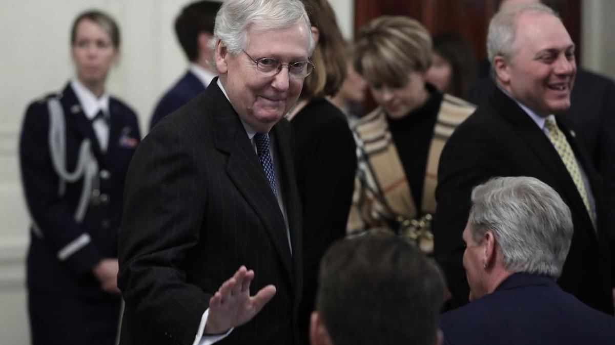 Senate GOP Majority Leader Mitch McConnell of Kentucky arrives before President Donald Trump’s remarks about his Senate impeachment trial in the East Room at the White House in Washington, D.C., on Feb. 6.