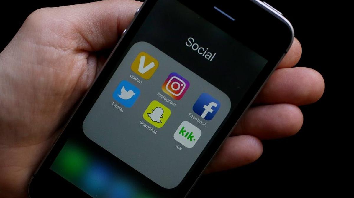 This June 16, 2017 photo shows social media app icons on a smartphone held by an Associated Press reporter in San Francisco. Google yourself. Curate your online photos. And as one private high school advises its students: Don't post anything online you wouldn't want your grandmother to see. AP spoke with experts on the role of social media in the college admissions process. They offered tips for students on what to post - and not post - if you're trying to get into college.
