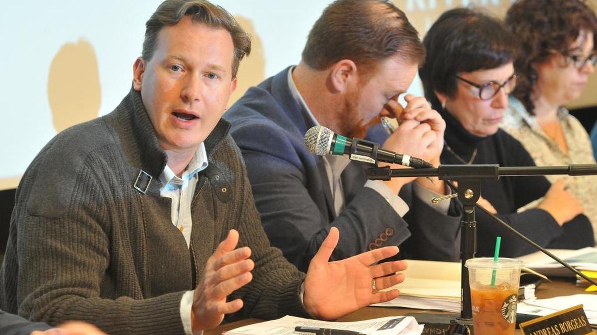 Fresno County Supervisor Andreas Borgeas, left, speaks during the San Joaquin River Conservancy Board meeting to vote on access to River West Open Space Area, at the Clovis Veterans Memorial District auditorium, Dec. 13. The meeting was well done, writes Paula Ann Costis of Fresno.