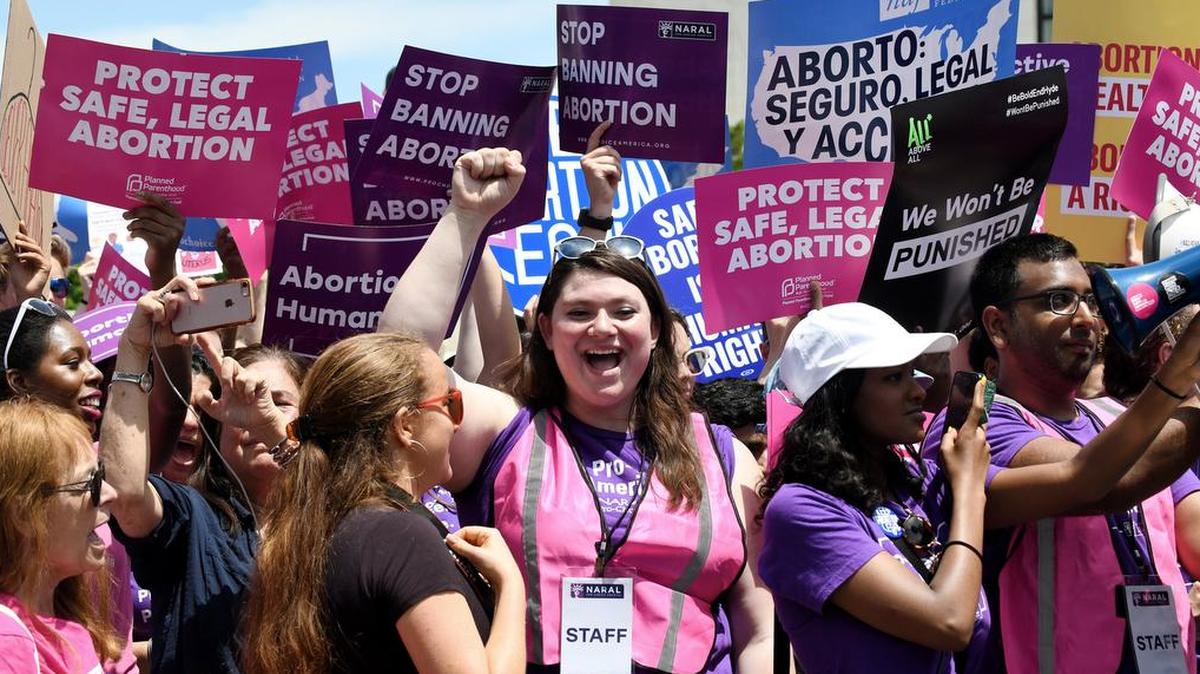 Pro-choice activists hold placards during a rally at the Supreme Court in reaction to the passage of bills in Alabama, Georgia, Missouri and other states that restrict access to abortion on May 21, 2019 in Washington, D.C.