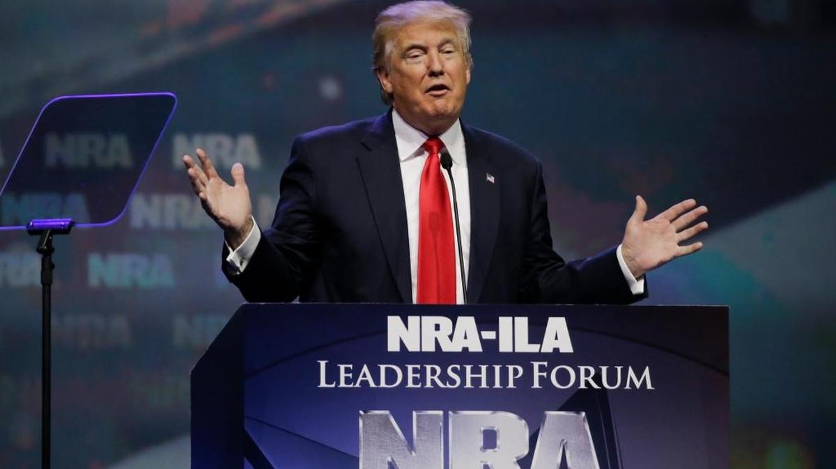 In this May 20, 2016, file photo, then-Republican presidential candidate Donald Trump speaks at the National Rifle Association (NRA) convention in Louisville, Ky.