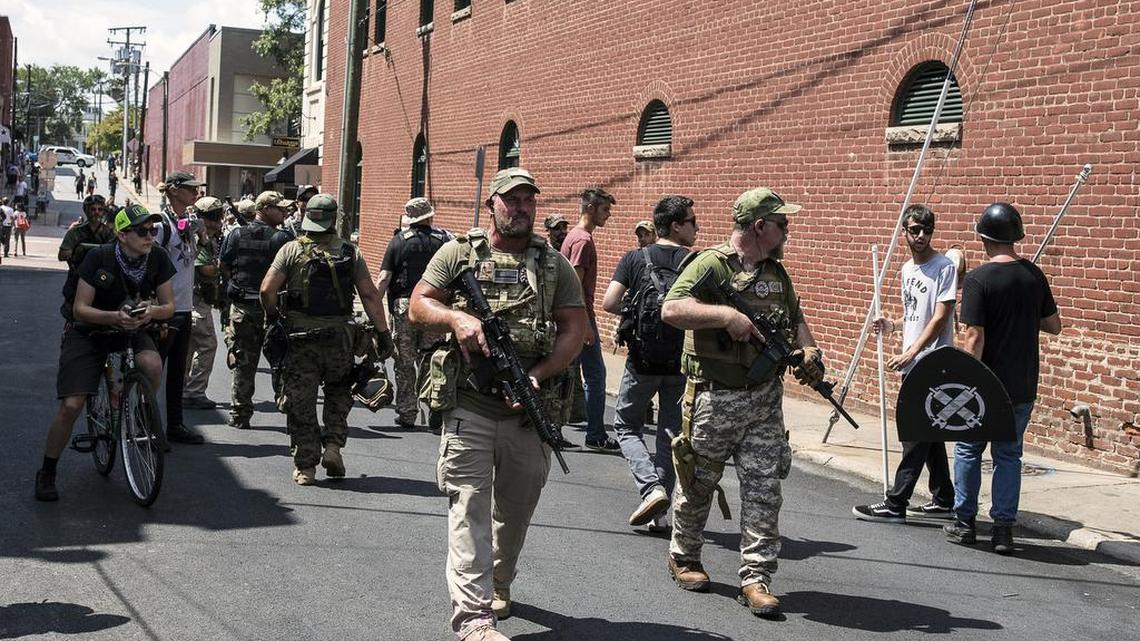 Armed members of a right-wing militia in Charlottesville, Virginia, the site of the "Unite the Right" rally, on Aug. 12, 2017. The rising visibility of such groups has put a spotlight on the word “militia” itself, with many critics demanding it be replaced.