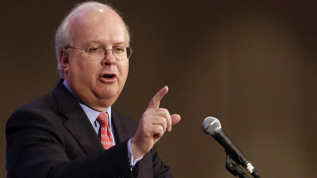 This March 2013 photo shows Republican strategist Karl Rove speaking in Sacramento. He has become friends with a political opponent, Democrat strategist David Axelrod.