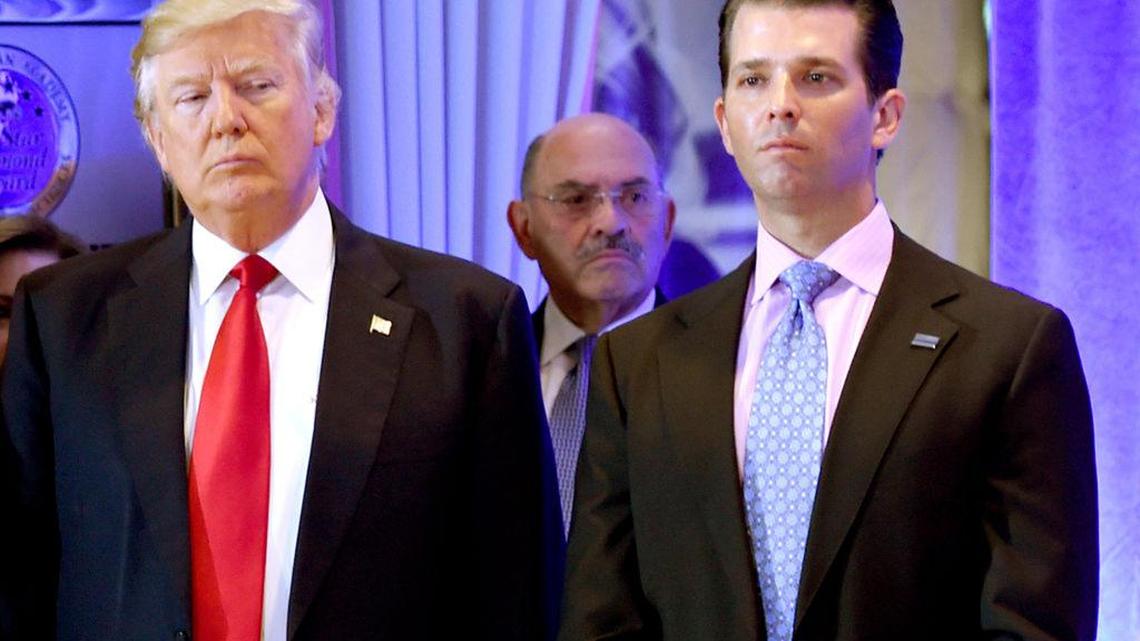 Former President Trump and son Donald Jr. arrive for a press conference at Trump Tower in New York, as Allen Weisselberg (center), chief financial officer of The Trump, looks on in 2017.