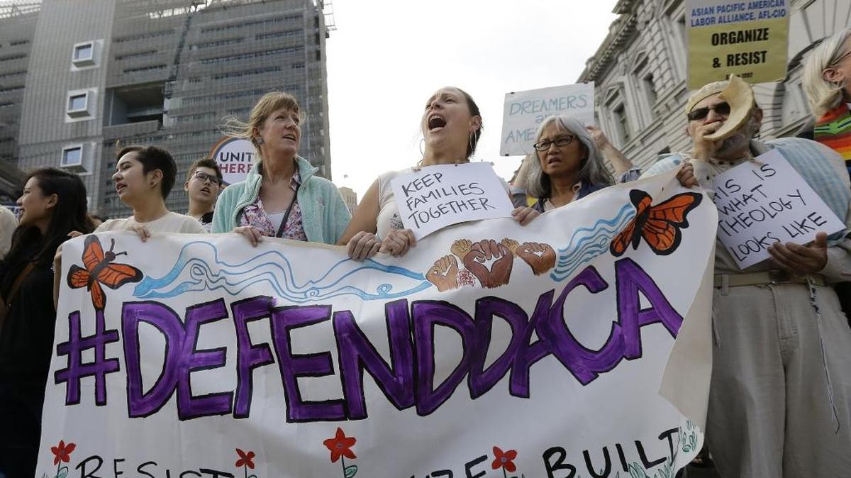 Supporters of the Deferred Action for Childhood Arrivals (DACA) yell during a protest outside of the Federal Building in San Francisco Sept. 5.