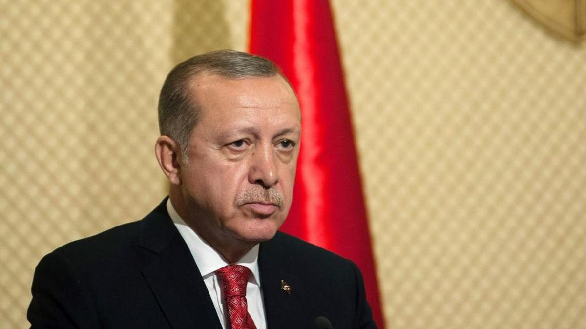 Turkish President Recep Tayyip Erdogan pauses as he speaks during a media conference at the Presidential Palace in Carthage, outside Tunis, Tunisia, Wednesday.