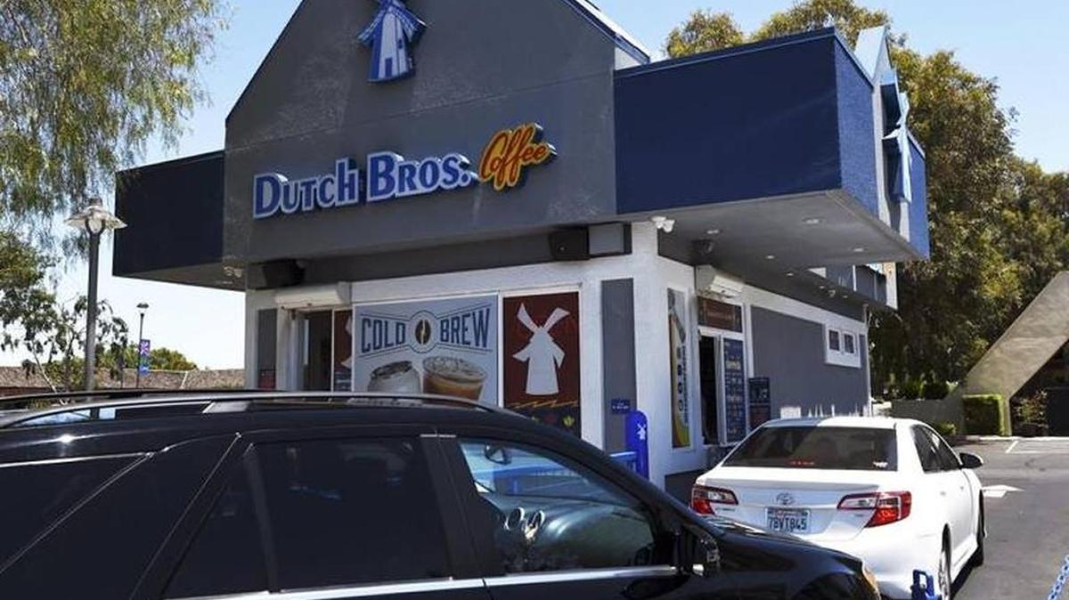 Cars line up at the Dutch Bros. drive-through kiosk at Bullard and West avenues in northwest Fresno. Clovis will be getting their own Dutch Bros in 2019.