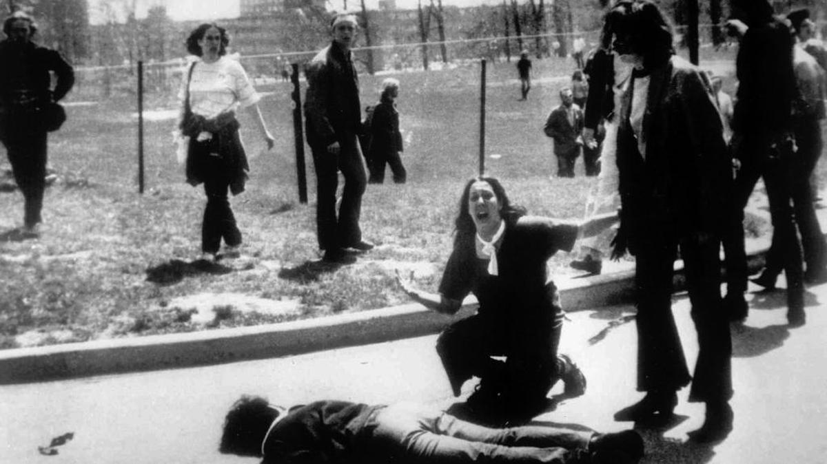 Mary Ann Vecchio, 14 at the time, screams as she kneels next to the body of student Jeffrey Miller at Kent State on May 4, 1970. Ohio National Guard troops fired 67 shots. When the firing ended, nine students lay wounded, and four others had been killed. Two of the students who died had not participated in the protests.
