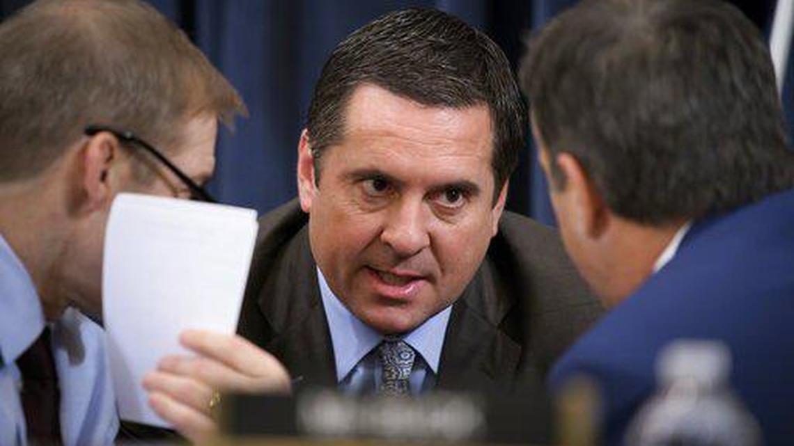 In this Dec. 9, 2019 file photo, Rep. Devin Nunes, R-Tulare, the ranking member of the House Intelligence Committee, confers with Rep. Jim Jordan, R-Ohio, and Rep. John Ratcliffe, R-Texas, during a break as the House Judiciary Committee considers the investigative findings in the impeachment inquiry against President Donald Trump, on Capitol Hill in Washington.