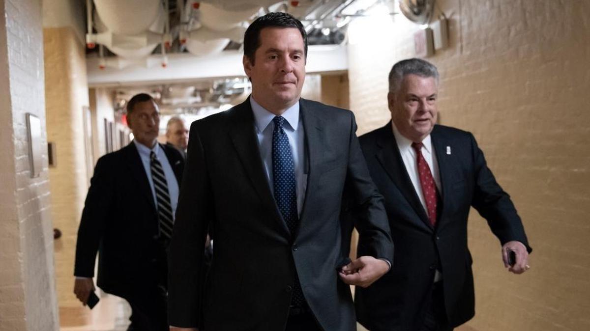 In this Feb. 6, 2018, file photo, then House Intelligence Committee Chairman Devin Nunes, R-Tulare, walks with Rep. Peter King, R-N.Y., also a member of the Intelligence Committee, at the Capitol in Washington.