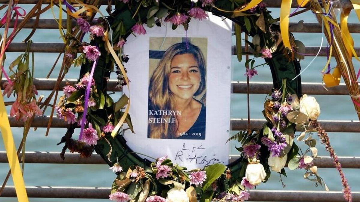A portrait of Kate Steinle is shown in this 2015 file photo at a memorial on Pier 14 in San Francisco. Opening arguments started Monday in the trial of the man charged with her murder, Jose Ines Garcia Zarate.