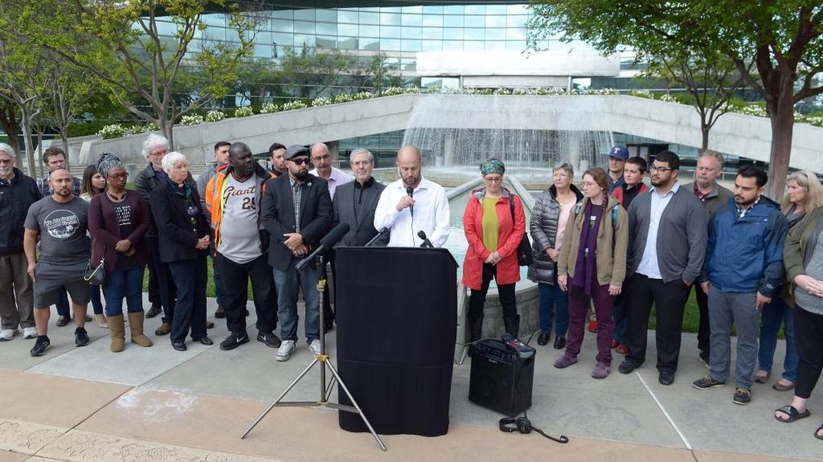 Andy Levine, executive director of Faith in Fresno, speaks out against violence at a gathering of faith leaders last April.