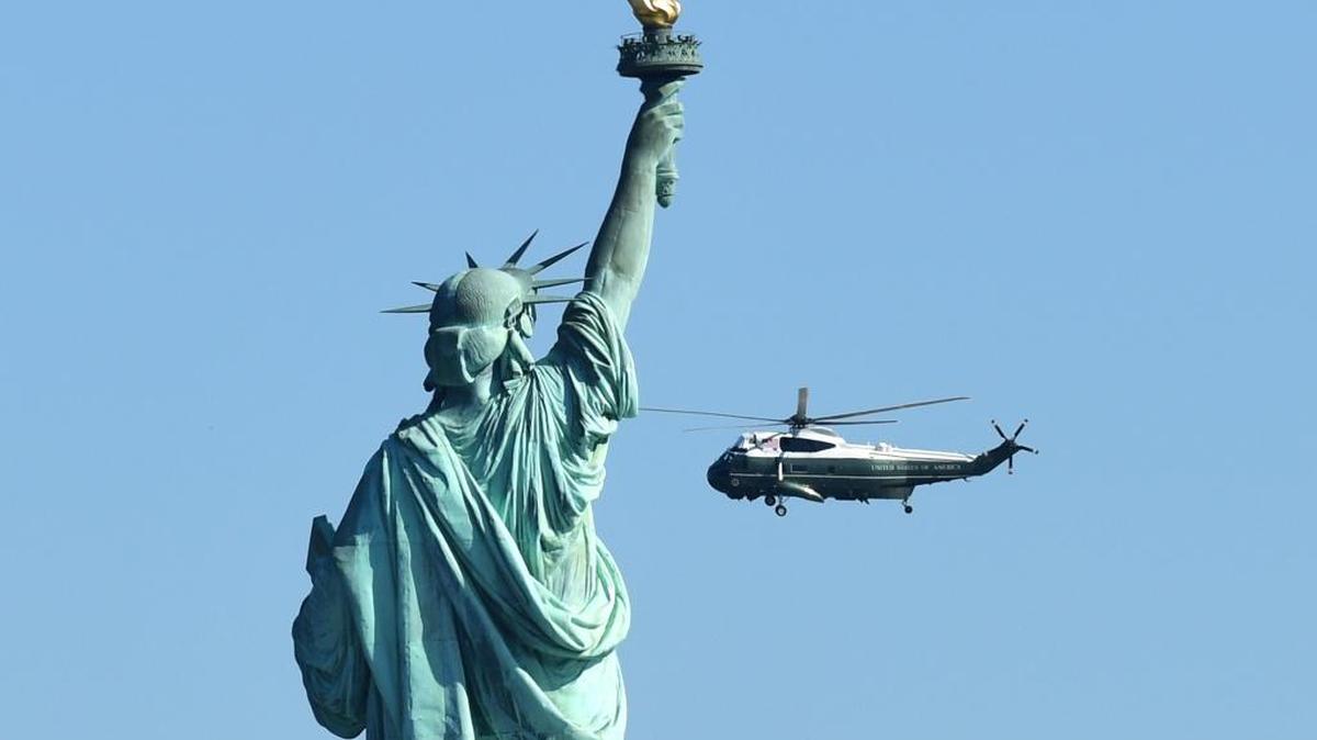 Marine One, with President Donald Trump on board, flies past the Statue of Liberty, as it heads to the Liberty Park landing zone in Jersey City, N.J., Sunday. Trump is determined to undermine all Lady Liberty stands for, writes Philip Traynor of Fresno