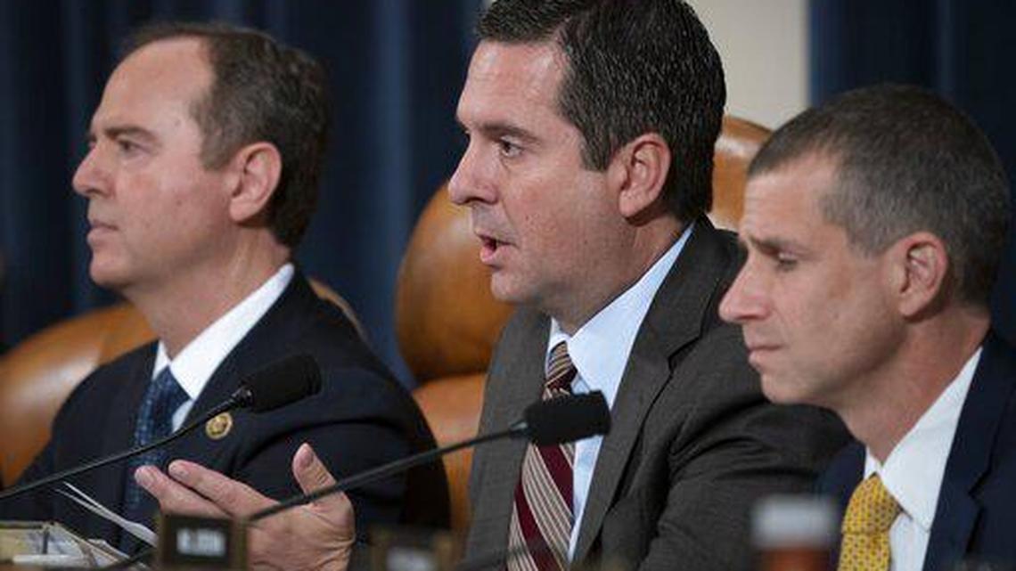 Rep. Devin Nunes, R-Calif., the ranking member of the House Intelligence Committee, joined at left by Chairman Adam Schiff, D-Calif., questions National Security Council aide Lt. Col. Alexander Vindman, on Capitol Hill in Washington, Tuesday, Nov. 19, 2019, during a public impeachment hearing of President Donald Trump’s efforts to tie U.S. aid for Ukraine to investigations of his political opponents.