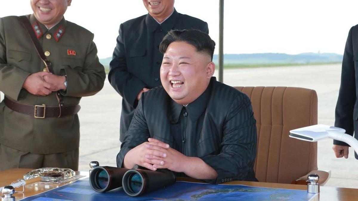 North Korean leader Kim Jong Un, center, attends what was said to be the test launch of an intermediate range Hwasong-12 missile at an undisclosed location in North Korea. Kim is calling President Donald Trump "deranged" after Trump referred to him as “Rocket Man.” Jess King of Fresno says the Devo tune “Human Rocket” fits him better