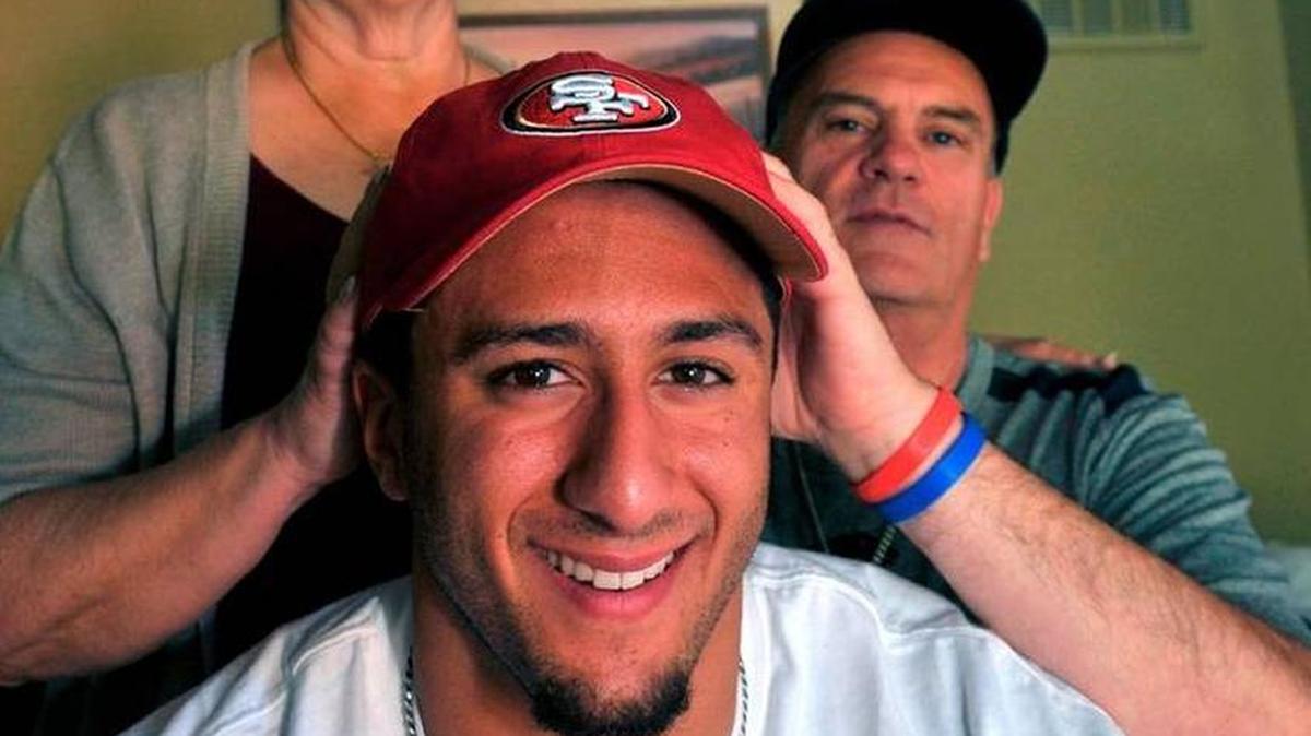Parents Teresa and Rick with their son Colin Kaepernick in a 49er cap at their Turlock home after in the 2nd round of the NFL draft he was picked by the San Francisco 49ers.