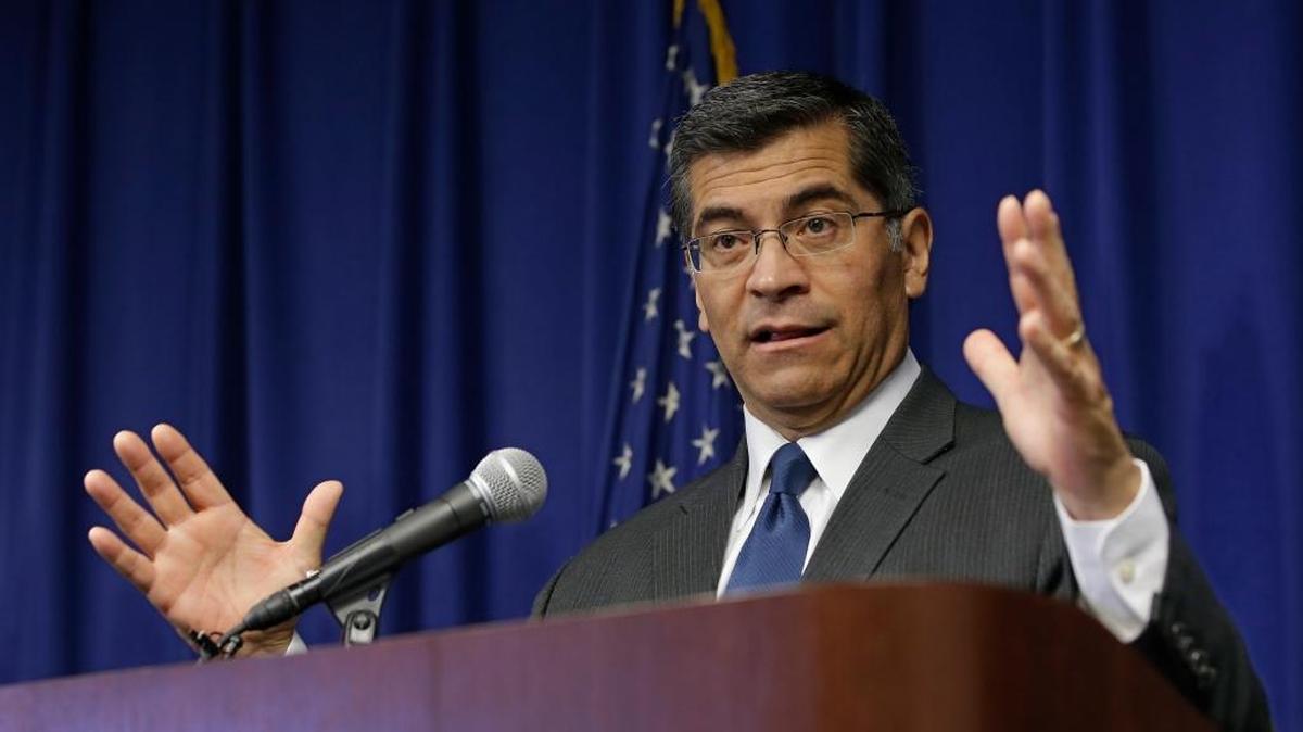 California Attorney General Xavier Becerra discusses reports that wide-spread federal immigration raids may be planned soon in Northern California, at a news conference Jan. 18 in Sacramento. Becerra warned employers that they must comply with a new California law that limits their cooperation with immigration officials.