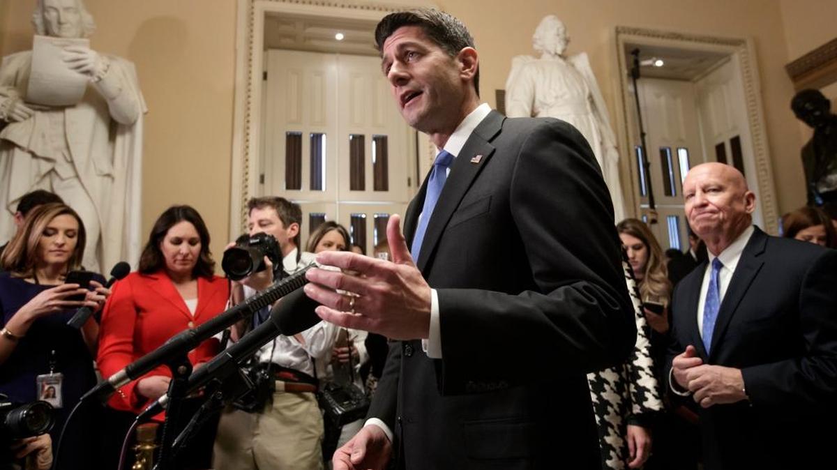 Speaker of the House Paul Ryan, R-Wis., joined at right by House Ways and Means Committee Chairman Kevin Brady, R-Texas, meets reporters just after passing the Republican tax reform bill in the House of Representatives, on Capitol Hill, in Washington, Tuesday.